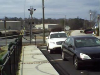 Norfolk Southern tank train with 2 covered hoppers northwest through Austell Ga.