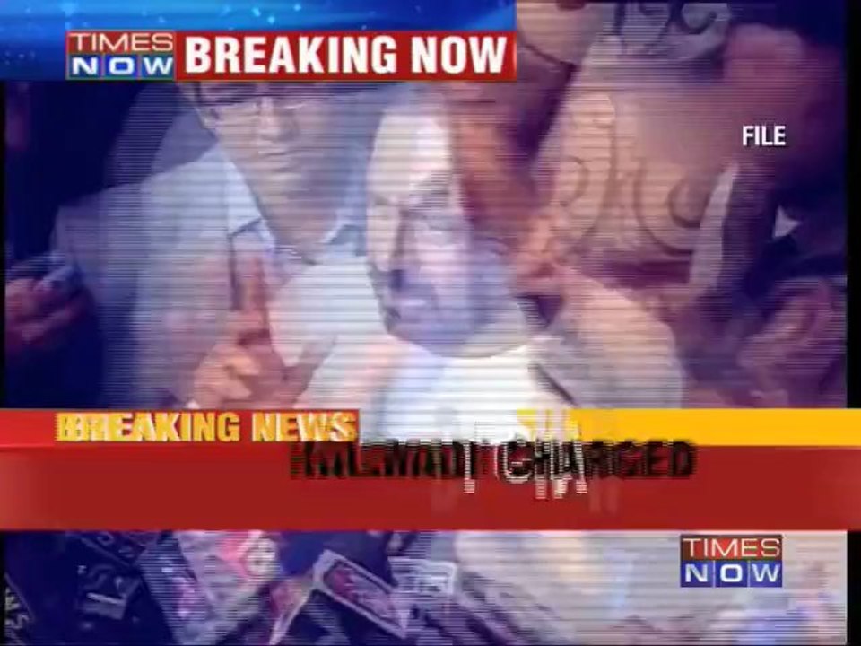 Suresh Kalmadi, aides charged