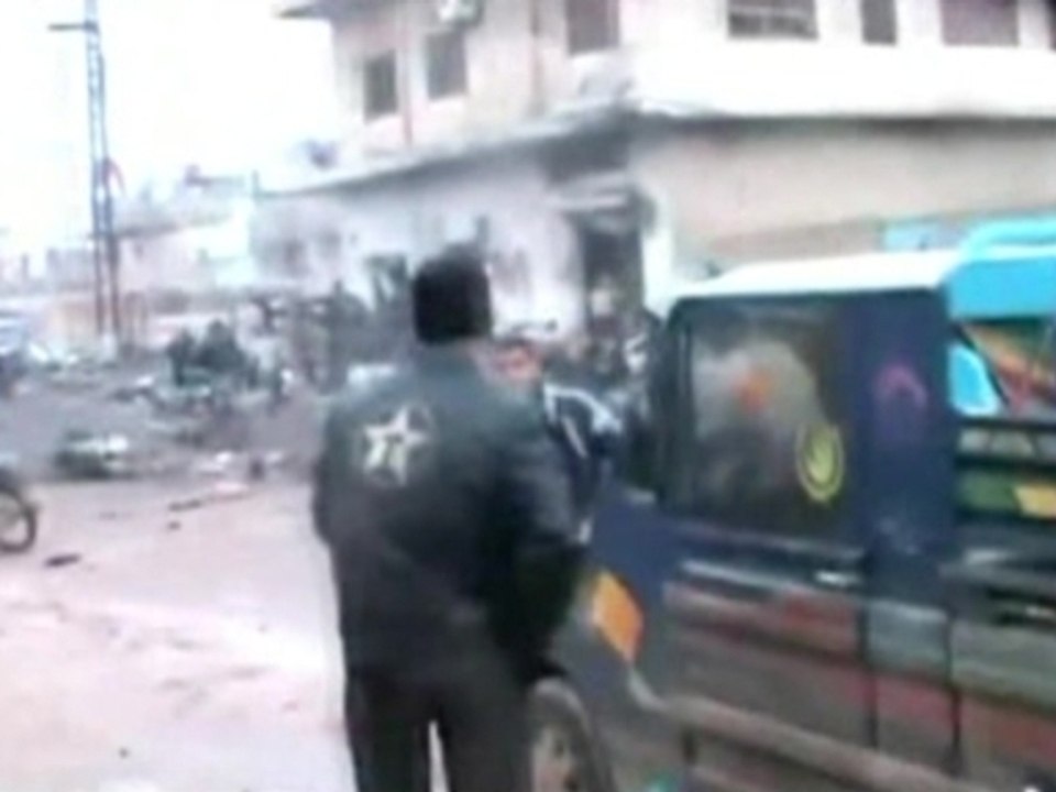 Dozens die in air strike on bakery in central Syria