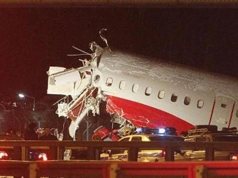 Russian plane crash lands on highway