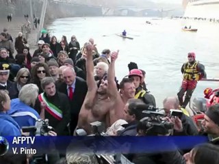 Rome celebrates New Year with fireworks, river dive