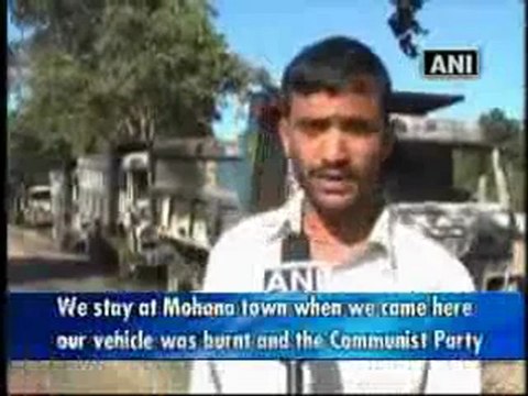 Maoists burn vehicles in Orissa.mp4