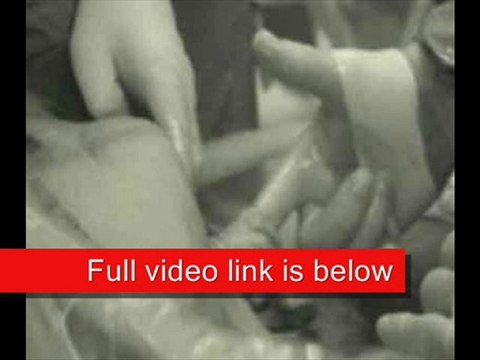 The miracle of childbirth: Amazing photo of baby reaching out from her mother grabs doctors finger