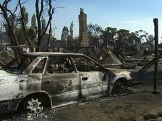 Residents survey bushfire devastation