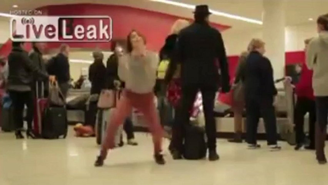 What the hell is that girl doing in the airport