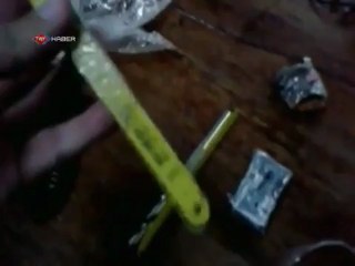 CEZA EVİNE TELEFON SOKARKEN YAKALANDI -