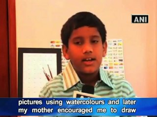 Child prodigy carves magic on rice grains.mp4