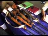 Police seize arms and ammunition, arrest suspected cadre.mp4