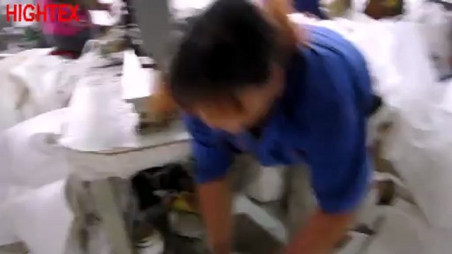 Lockstitch container bag sewing machine for sewing lifting loops