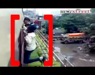 Death Game  Reckless boys jump before train.mp4