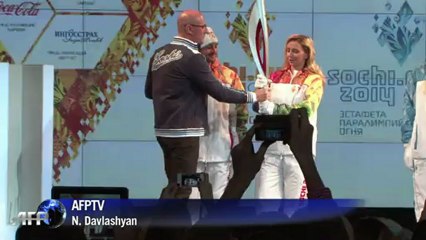 Russia unveils sleek Sochi Games torch