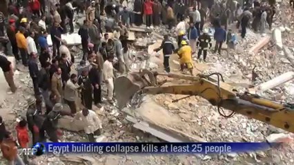 Egyptians sift through rubble of collapsed building