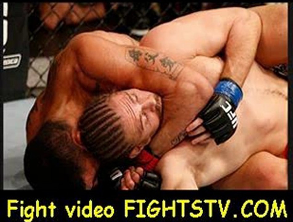 Ronny Markes attempts a rear choke submission against Andrew Craig in their middleweight fight at the UFC on FX