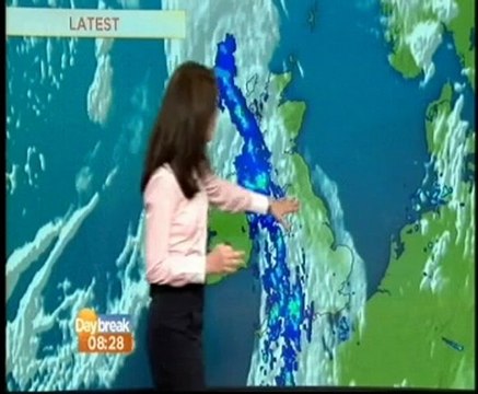 Laura Tobin wearing a pink full sleeved shirt from Jeetly petite