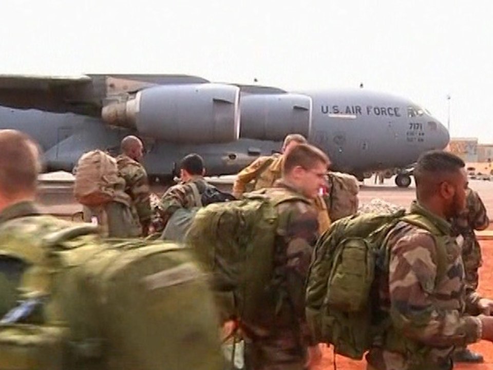 U.S. Planes Begin Transporting French Soldiers...