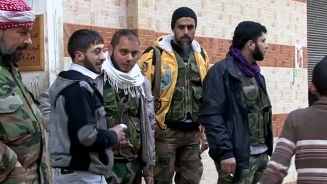 Syria defector swaps army trumpet for rebel rifle