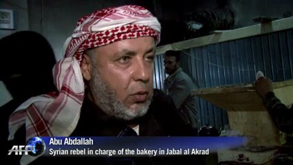 Rebels patrol Kurdish area of Jebel Akrad