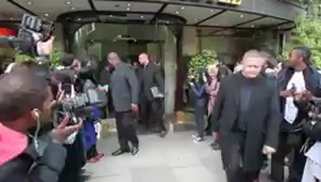 Kanye West Rocks Red Ski Mask in Paris