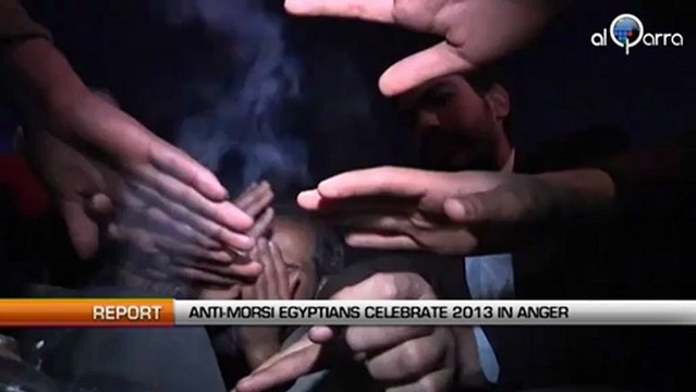 Anti-Morsi Egyptians celebrate 2013 in anger