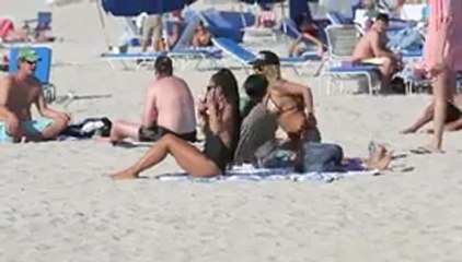 Christina Milian Dons Daring Swimsuit