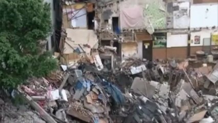 Sinkhole swallows whole building complex in China