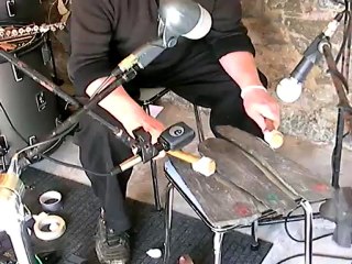 A  SLAMMER  ACCOMPANIED WITH MUSICAL STONES