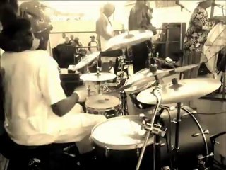 Funk Drummer Playing With Monkey On His Back