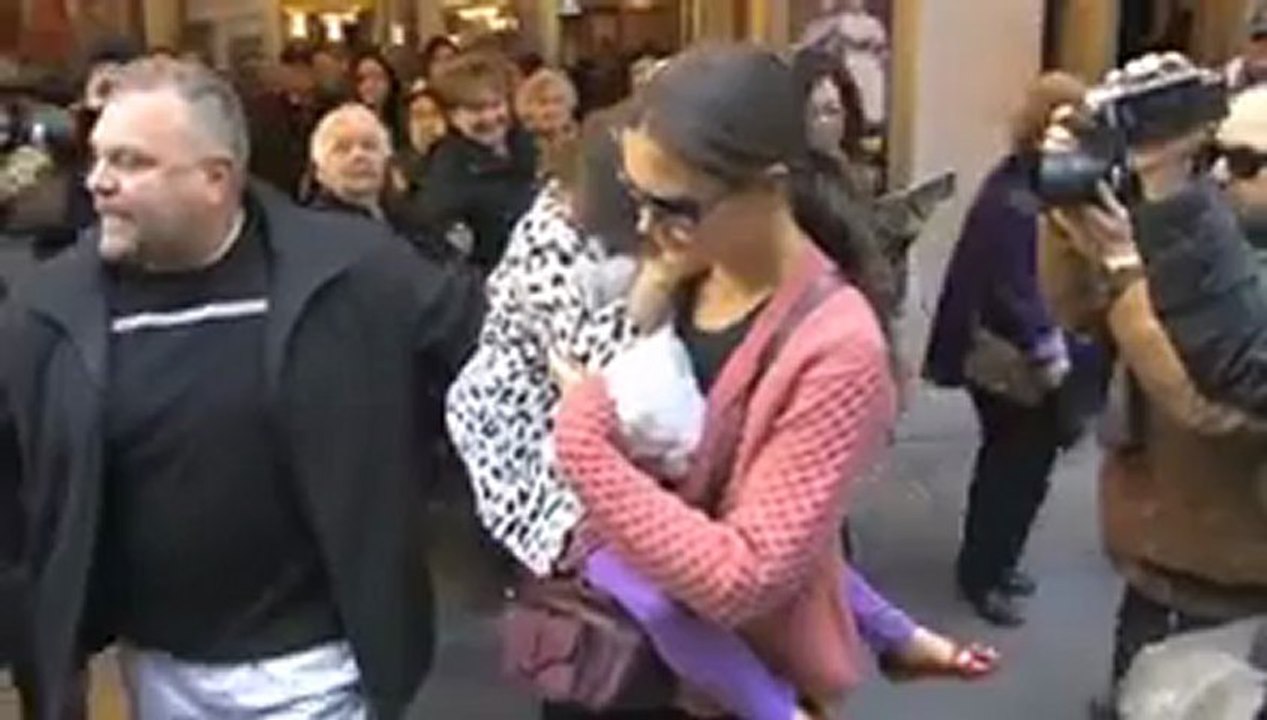 Suri Cruise in Knee-High Leather Boots