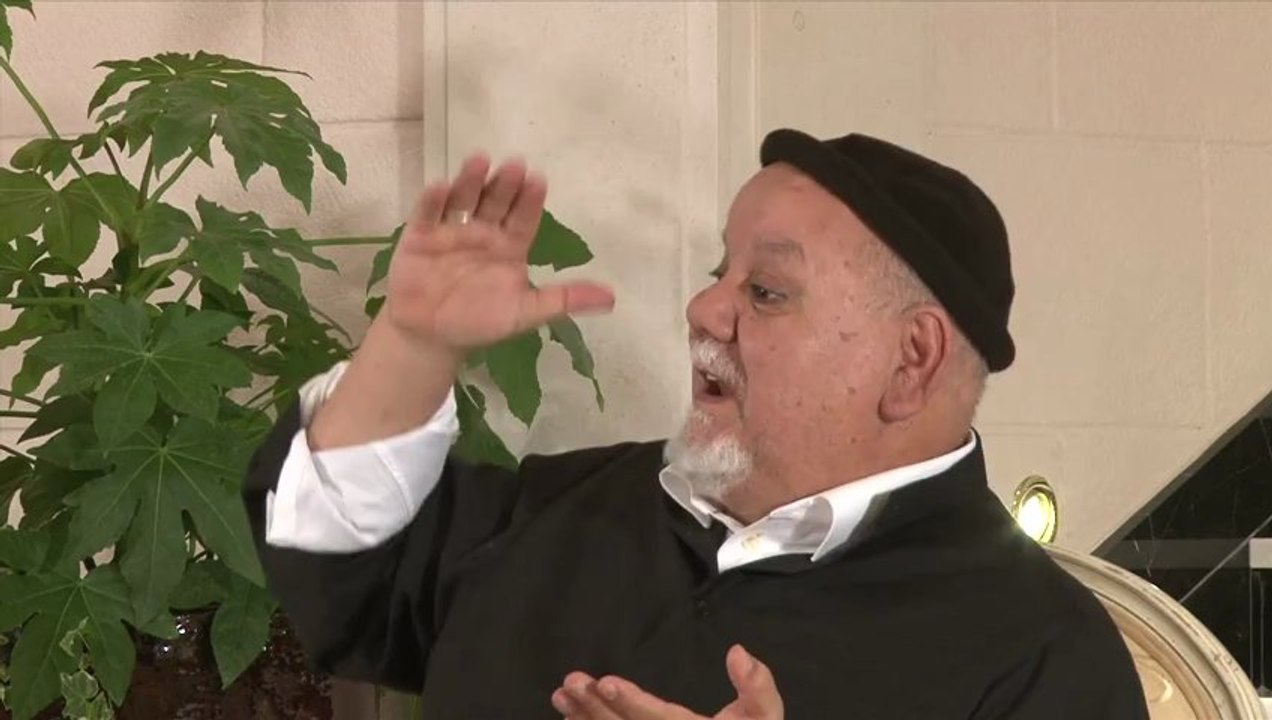 Le Prophète oummi et la langue du livre