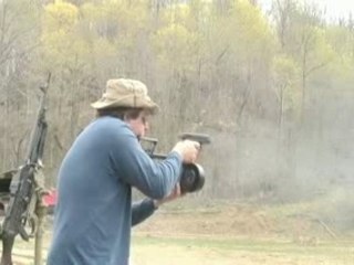 Glock with Drum Magazine