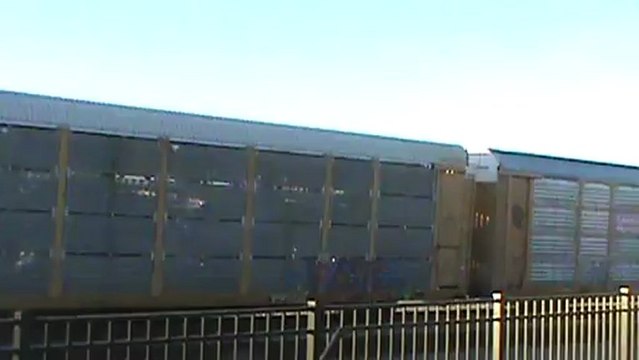 Norfolk Southern stack and autorack train southeast through Austell Ga.