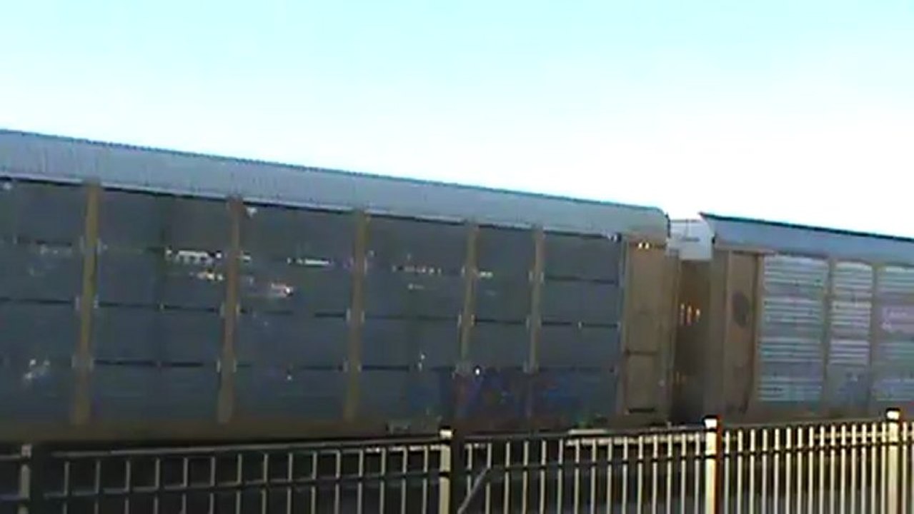 Norfolk Southern stack and autorack  train southeast through Austell Ga.