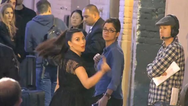 Kim Kardashian Shows Off Her Baby Bump in Tight Workout Gear Again