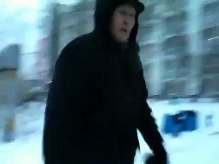 Mehran Muslimim  Walking down the street on Washington