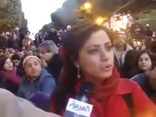 Tunisian Girl Sings during demonstration - Amal Mathluthi