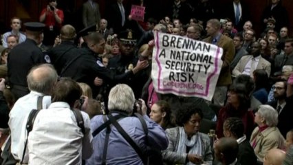 Protests erupt during Brennan's confirmation hearing