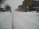 mehran muslimim Walking Down The Street In Blizzard