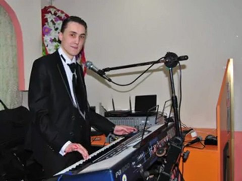 PİYANİST ŞANTÖR ERKAN - DUVARDAKİ RESİM