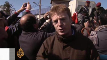 Clashes break out as Tunisian politician is laid to rest