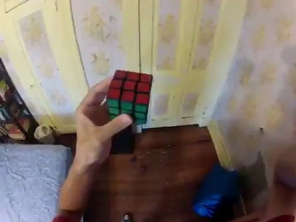 Résoudre en Rubik's Cube en jonglant