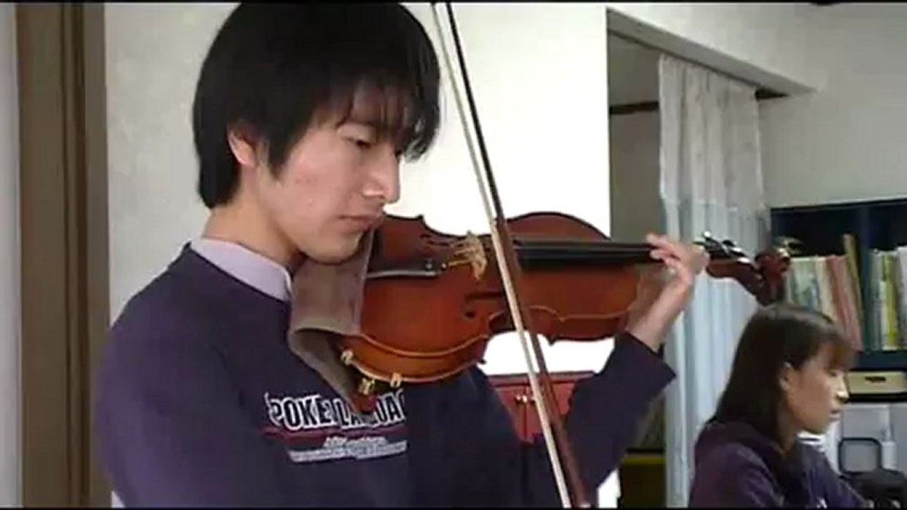 The guitar boy plays the violin. " Vitali Chaconne "