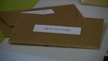 Oscar's winning envelopes are prepared ahead of Hollywood's big night