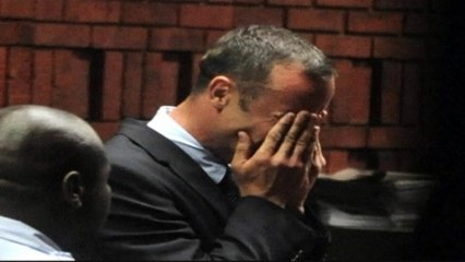 Pistorius weeps over murder charge