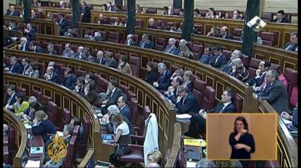 Spanish PM says economy is on the road to recovery