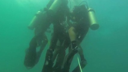 Cambodian de-miners plunge into dive training