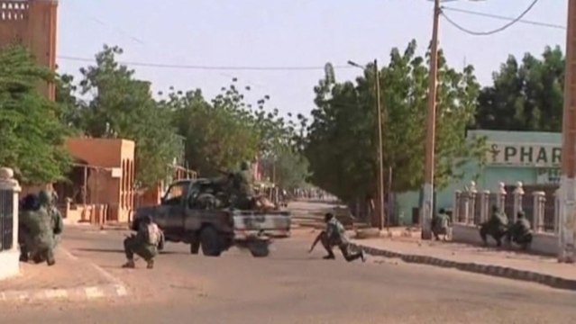 Malian forces battle suspected Islamists holed up in Gao