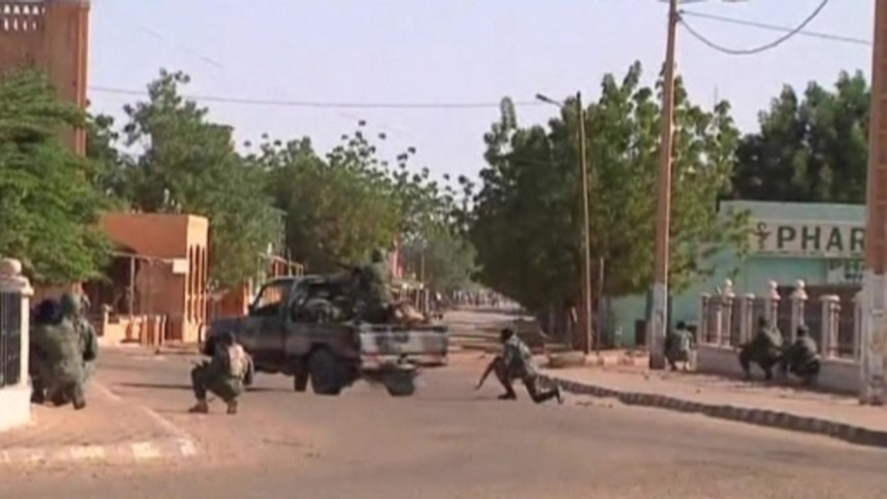 Malian forces battle suspected Islamists holed up in Gao