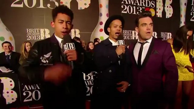 Robbie Williams Talks To Rizzle Kicks BRITs 2013
