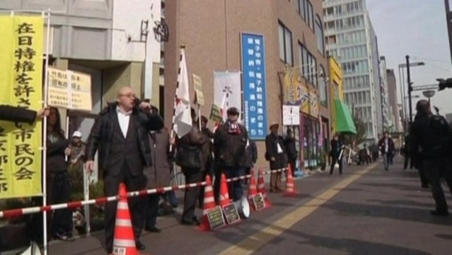 Japan and South Korea hold protests for disputed islands