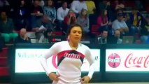 Cheerleader nails half-court shot with a flip